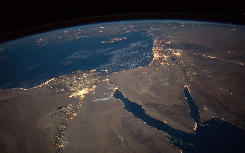 Nighttime view of northern Egypt and the Sinai Peninsula --- ISS049e004516 (09/16/2016) --- This nighttime view of northern Egypt and the Sinai Peninsula was captured by the Expedition 49 crew aboard the International Space Station. The city of Cairo can be seen to the left at the top of the Nile river. Atop the sparsely lit Sinai Peninsula can be seen cities in Israel, including the brightly lit city of Tel Aviv on the Israeli coast along the Mediterranean sea. https://www.flickr.com/photos/nasa2explore/29185511983/
.